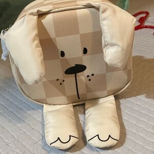Cream Dog-Shaped bag from bath and body works exclusive